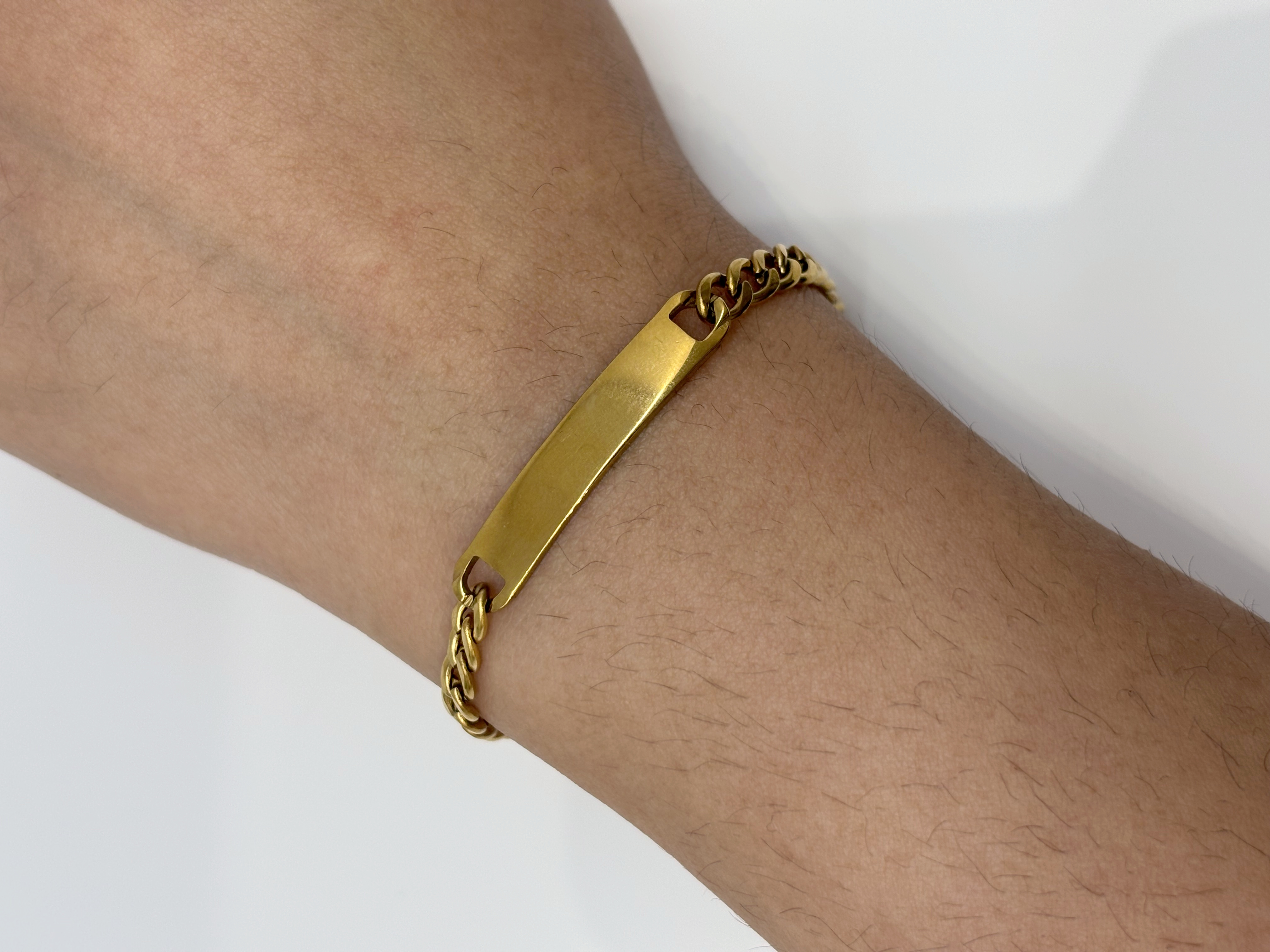 Bar Link gold plated bracelet worn on wrist