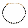 Black Bead gold plated bracelet on white background