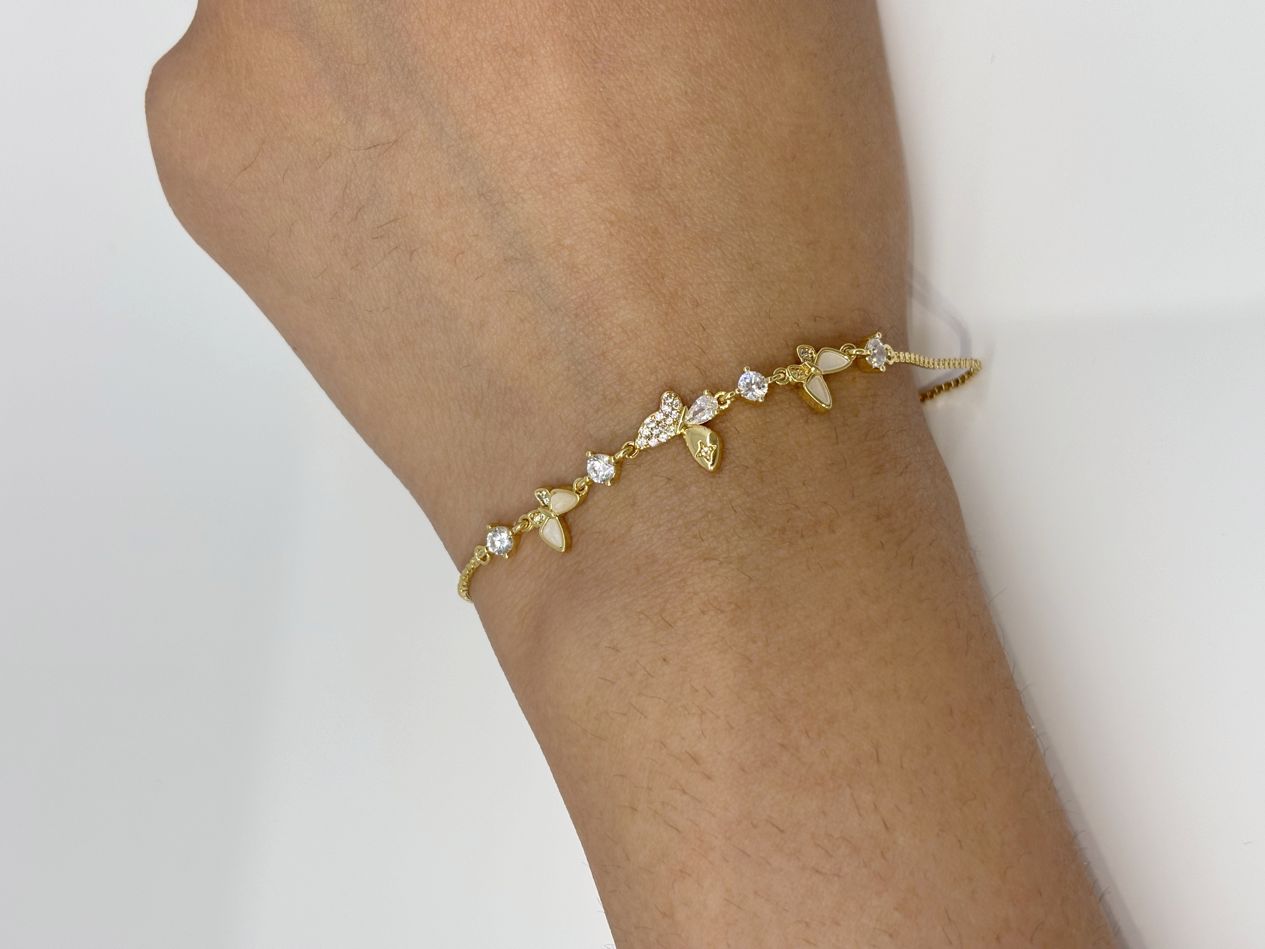 Botanical Leaf gold plated bracelet worn on wrist