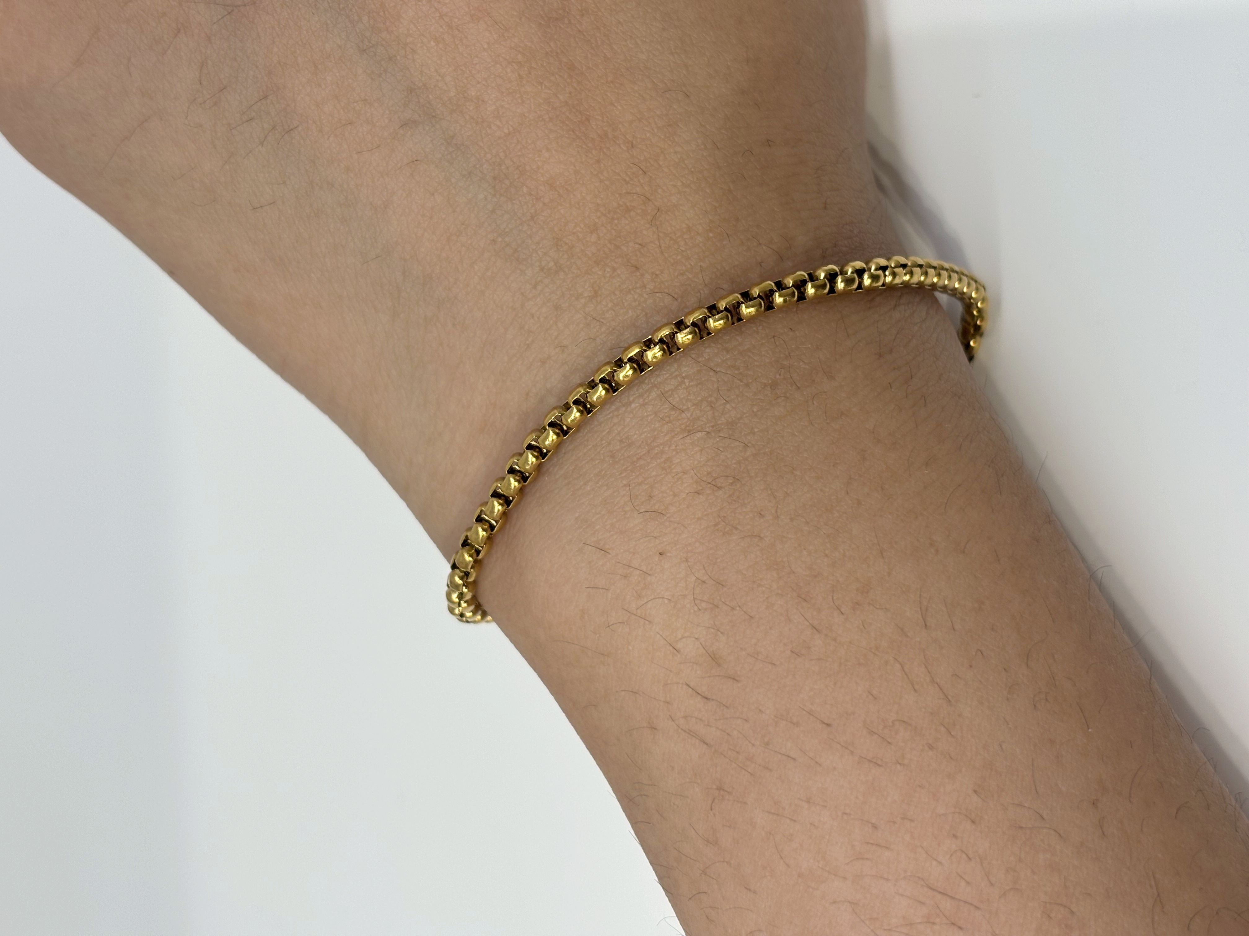 Box Chain gold plated bracelet worn on wrist