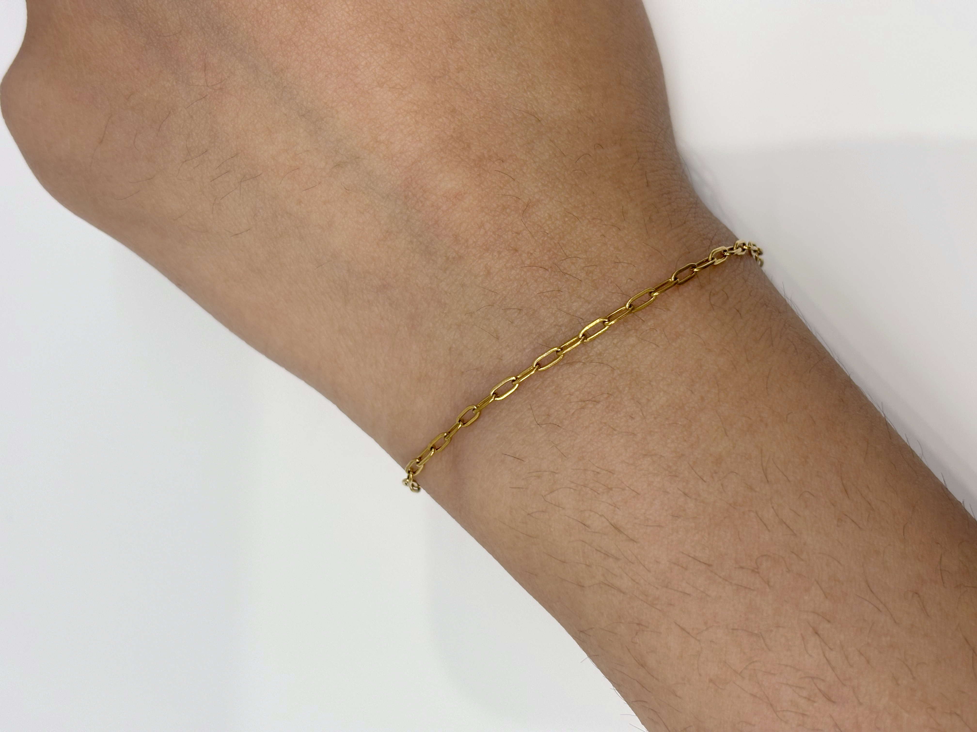 Classic Cable Chain gold plated bracelet worn on wrist