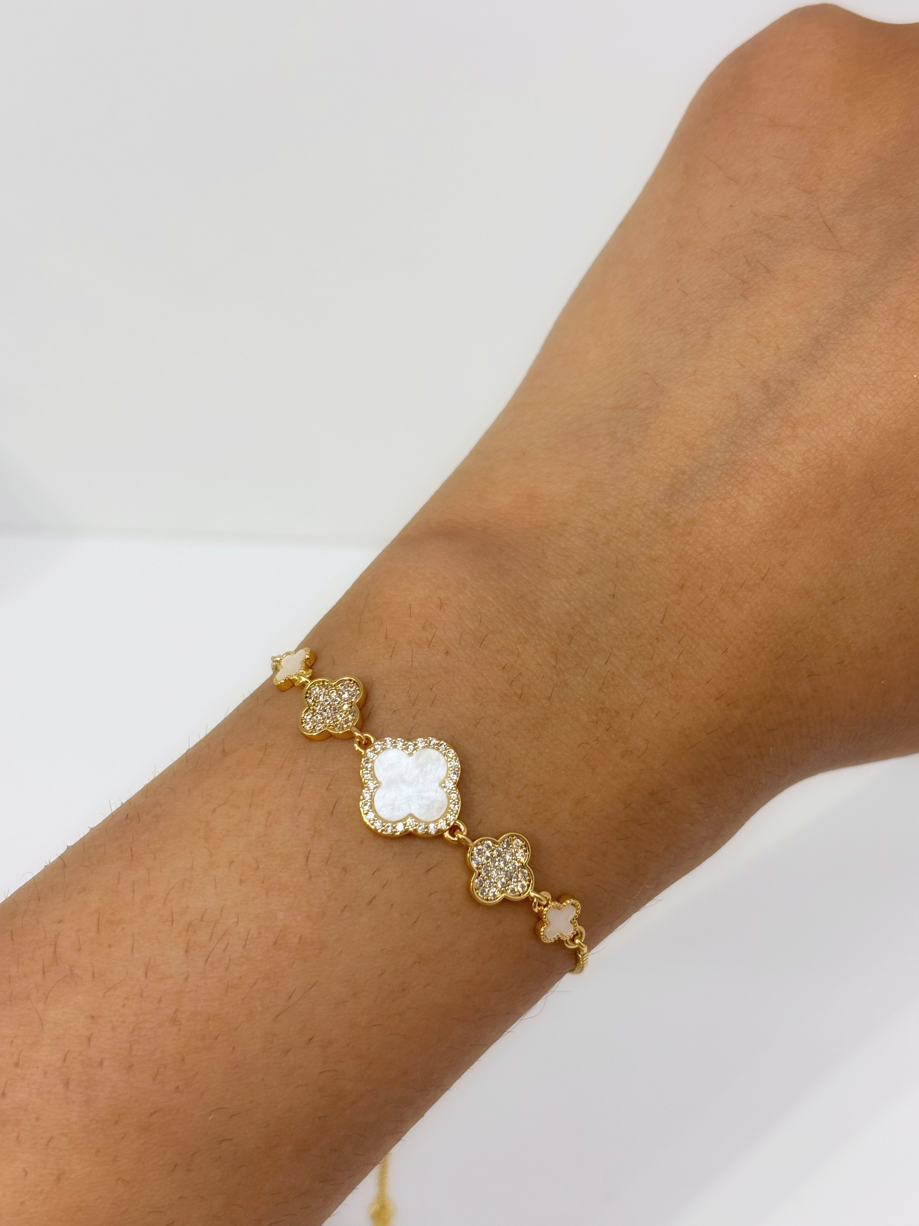 Clover Crystal gold plated bracelet worn on wrist