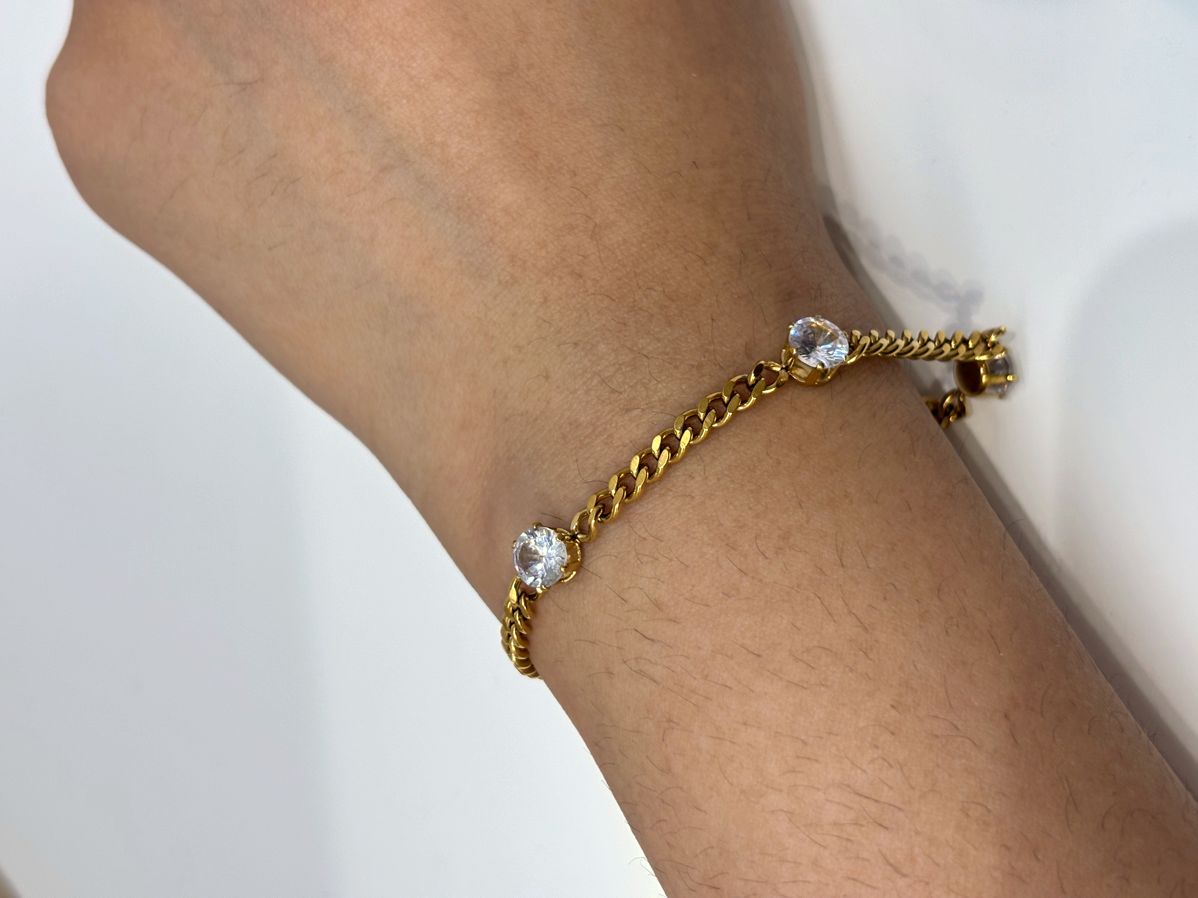 Crystal Curb gold plated bracelet worn on wrist