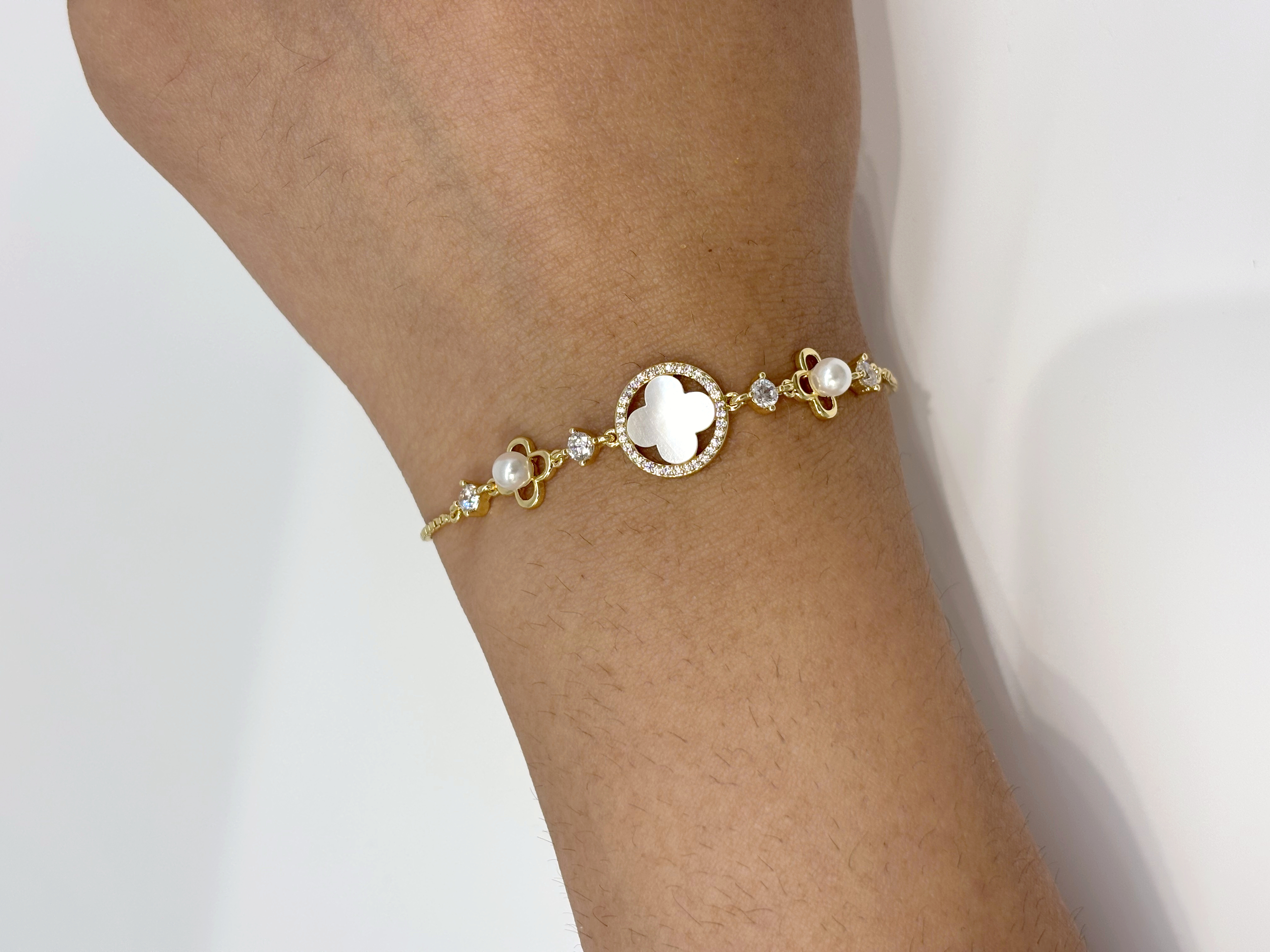 Crystal Disc gold plated bracelet worn on wrist