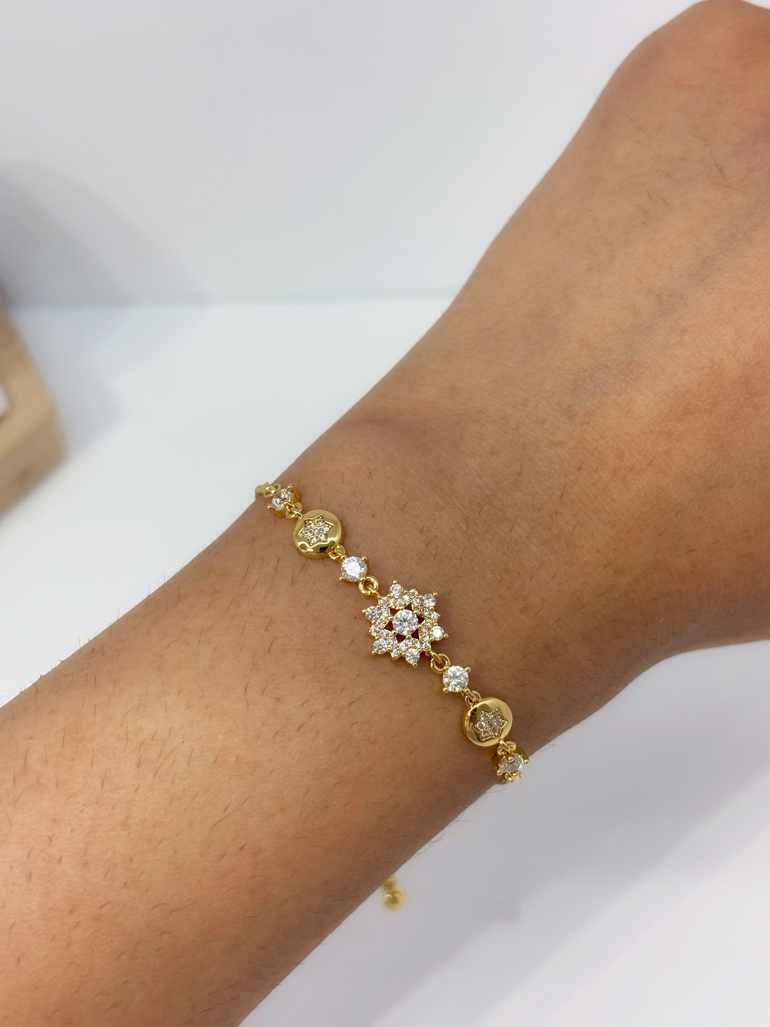 Crystal Floral Cluster gold plated bracelet worn on wrist