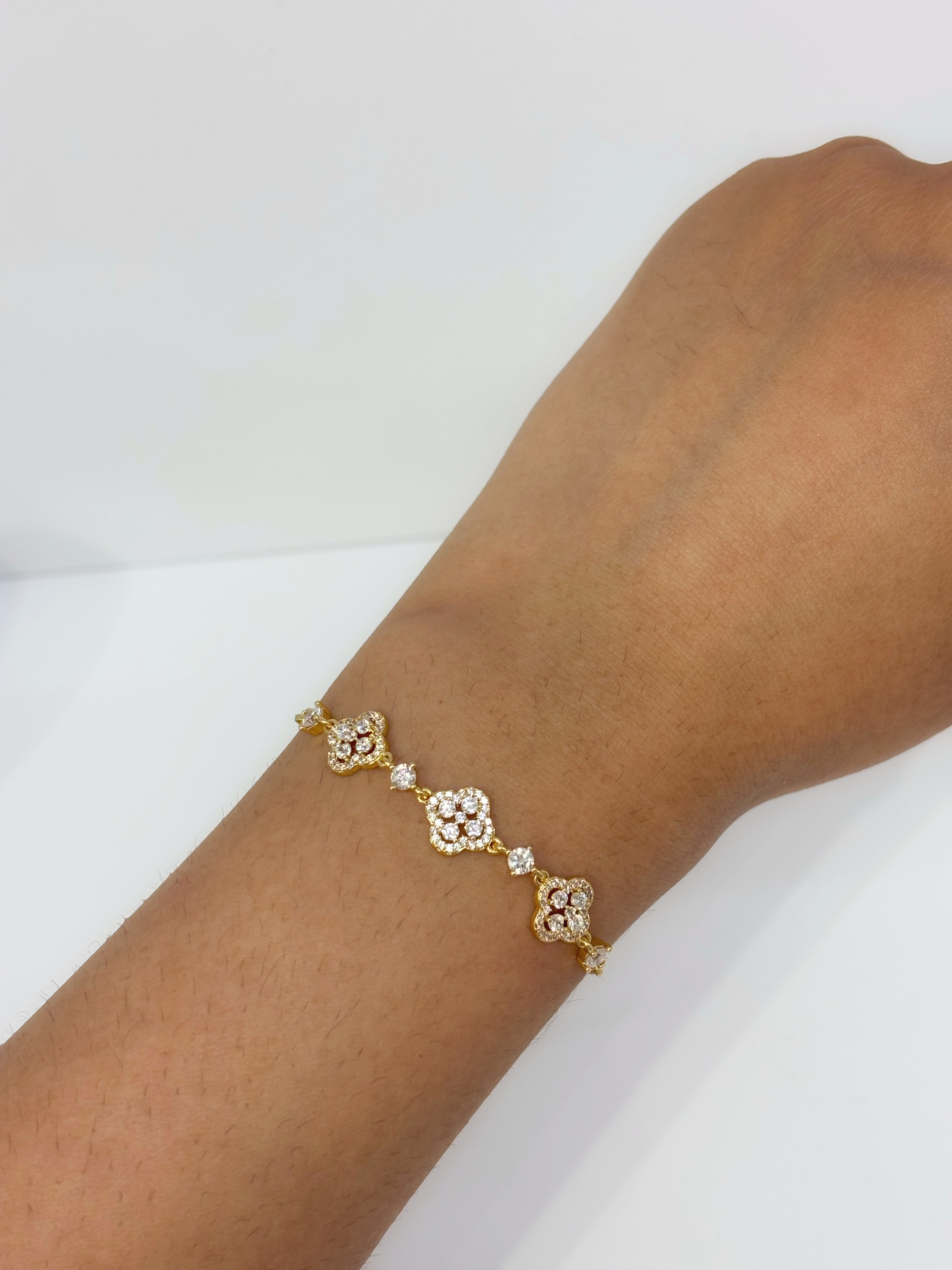 Crystal Flower gold plated bracelet worn on wrist
