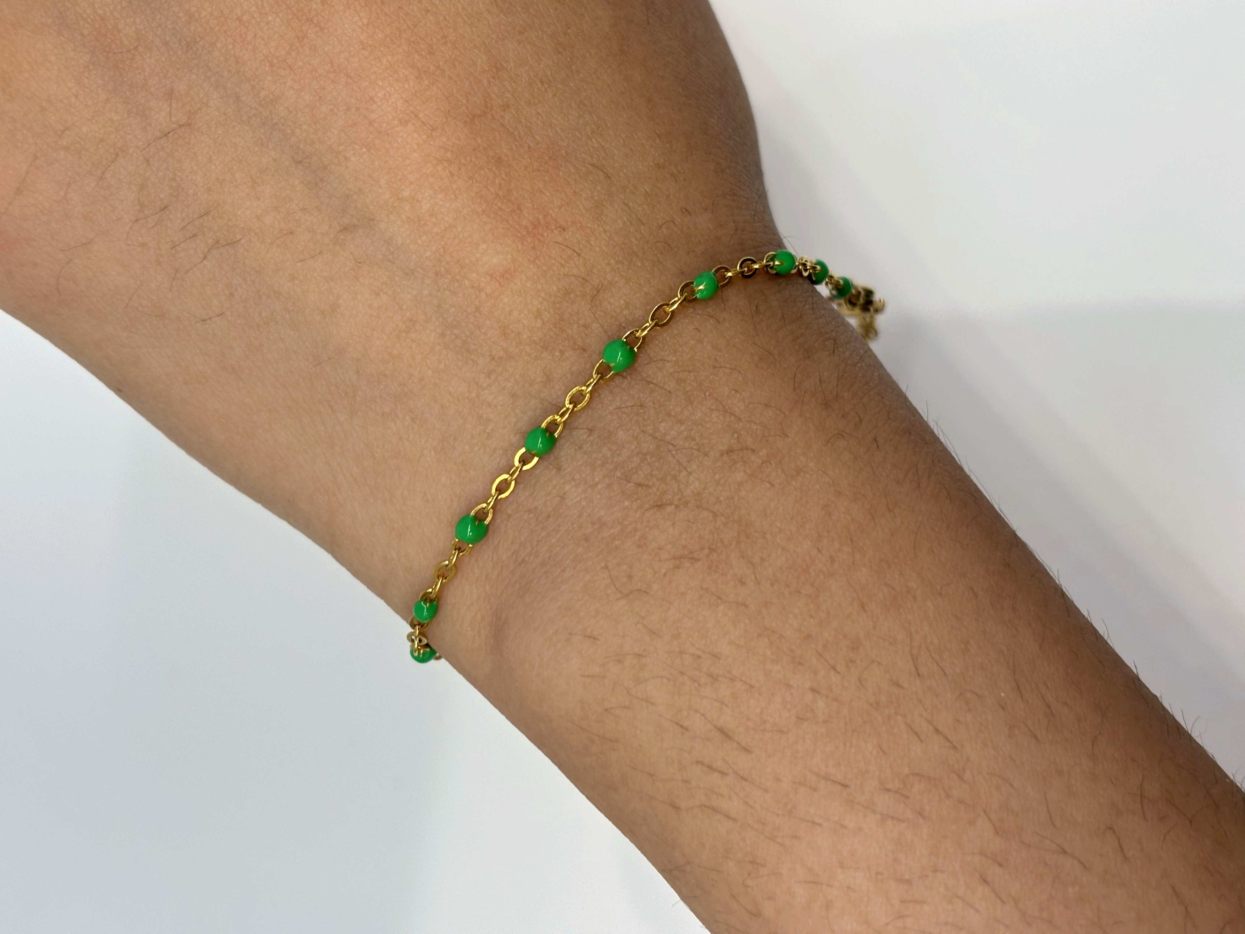 Emerald Bead gold plated bracelet worn on wrist