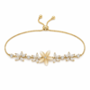 Five Flower Crystal gold plated bracelet on white background