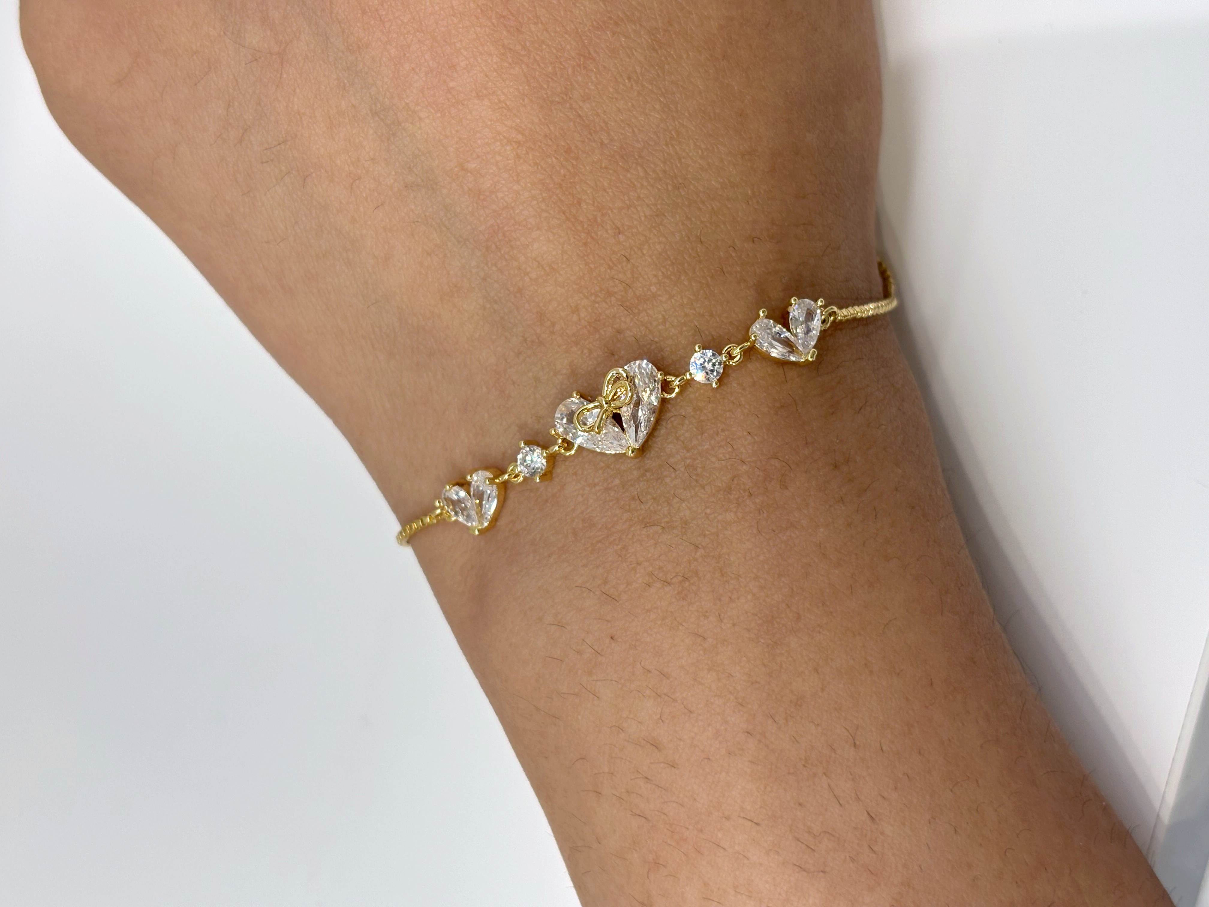 Floral Crystal gold plated bracelet worn on wrist