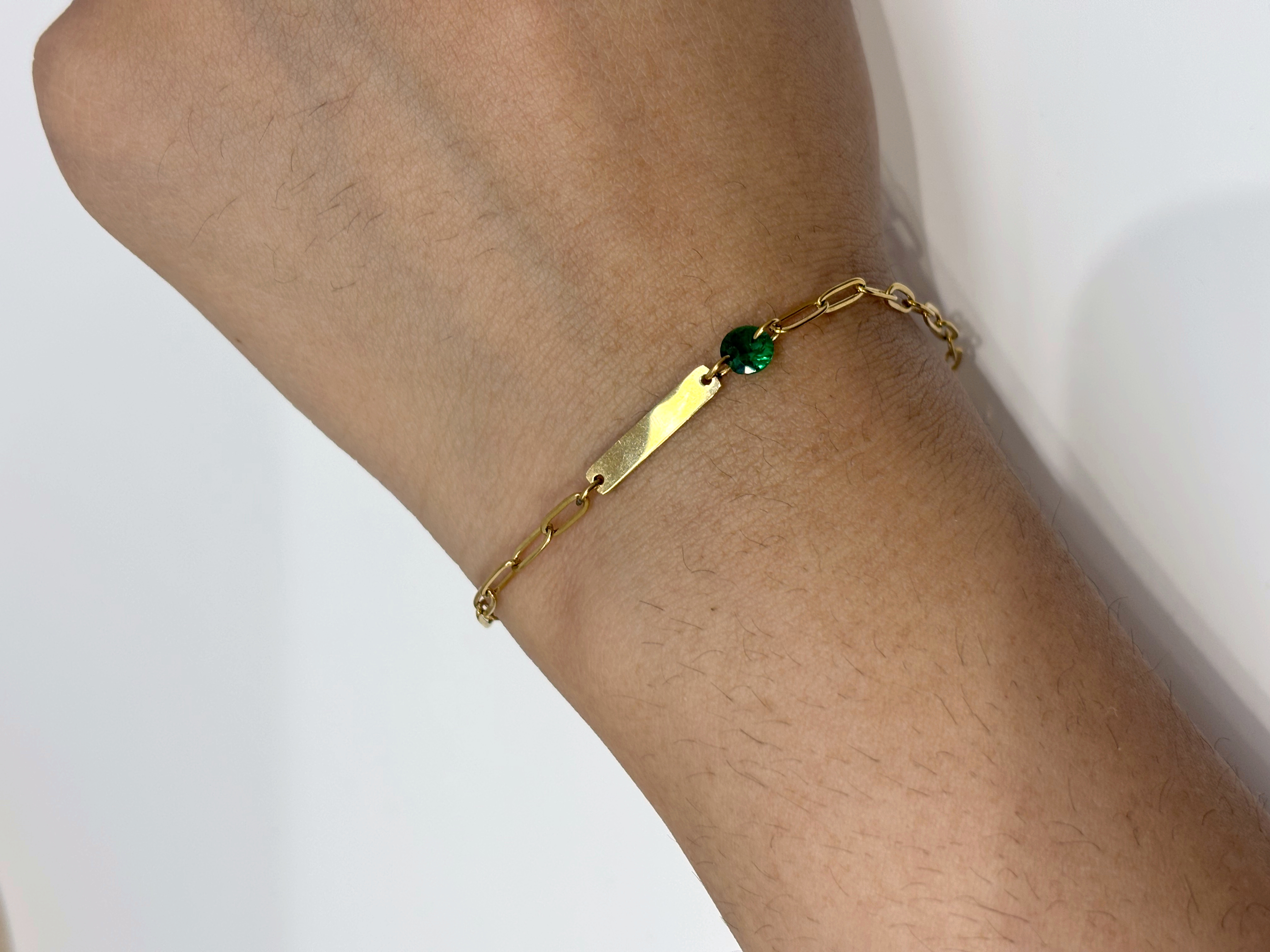 Green Bar gold plated bracelet worn on wrist