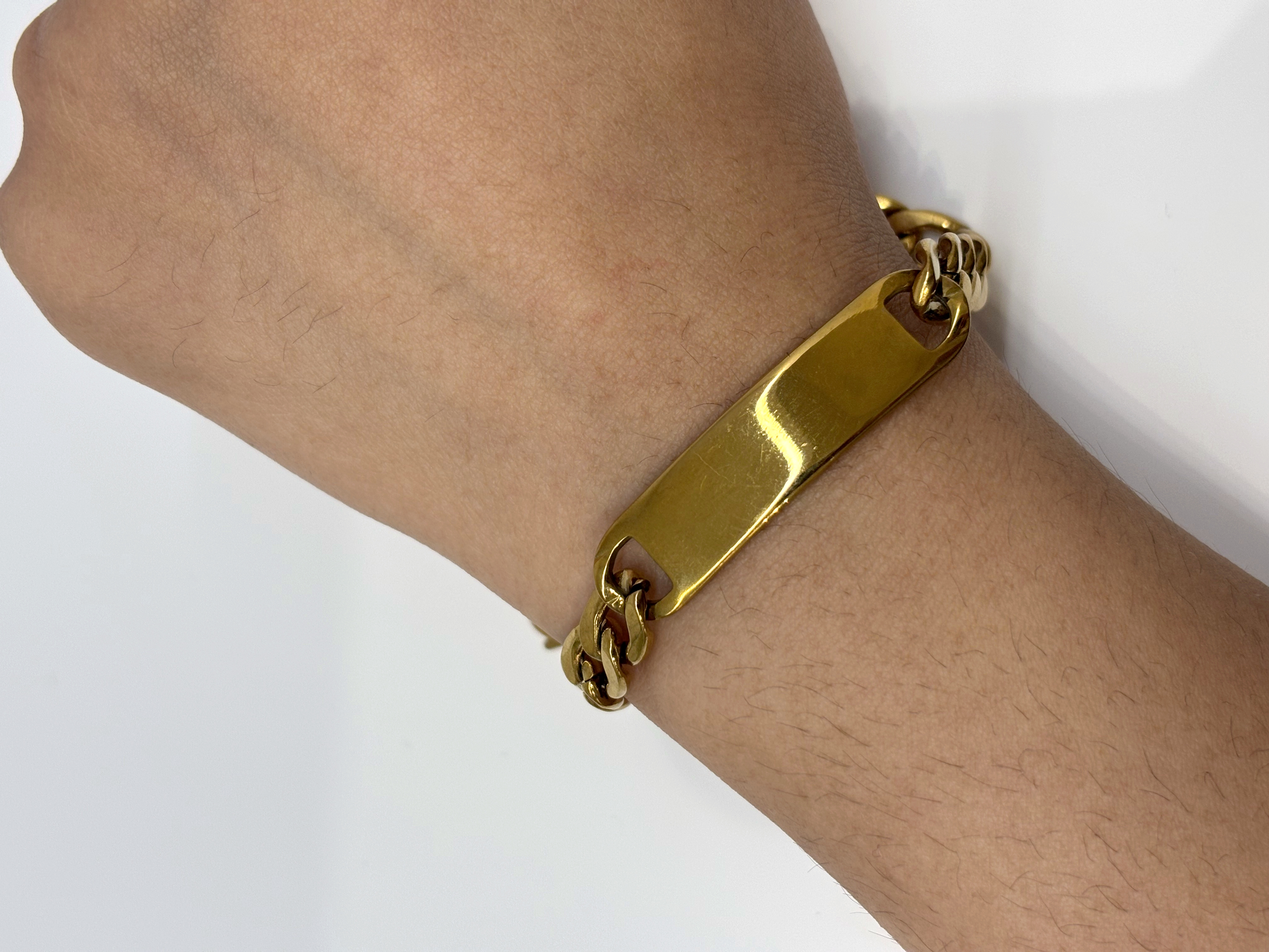 ID Plate Chain gold plated bracelet worn on wrist
