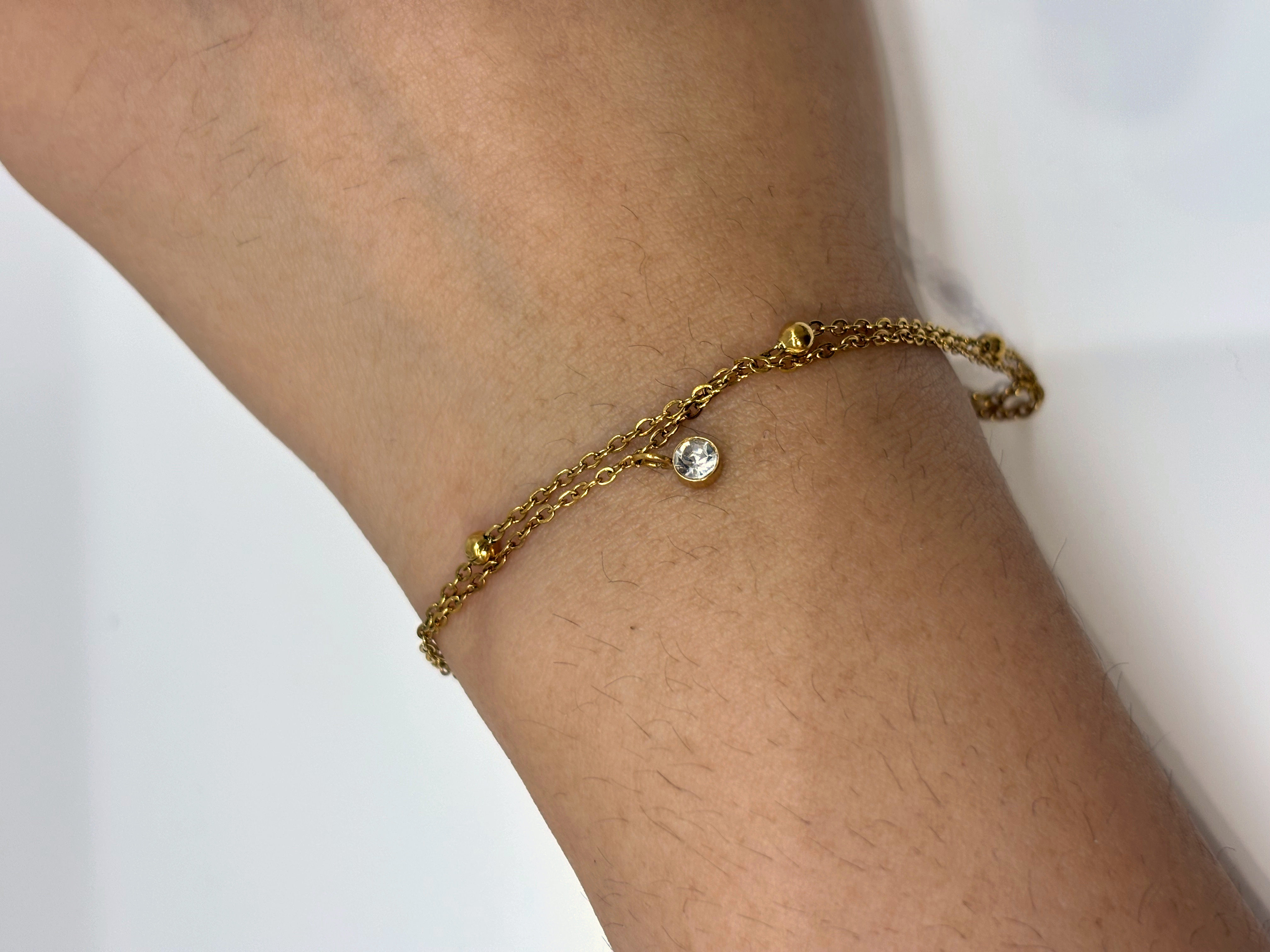 Layered Chain gold plated bracelet worn on wrist