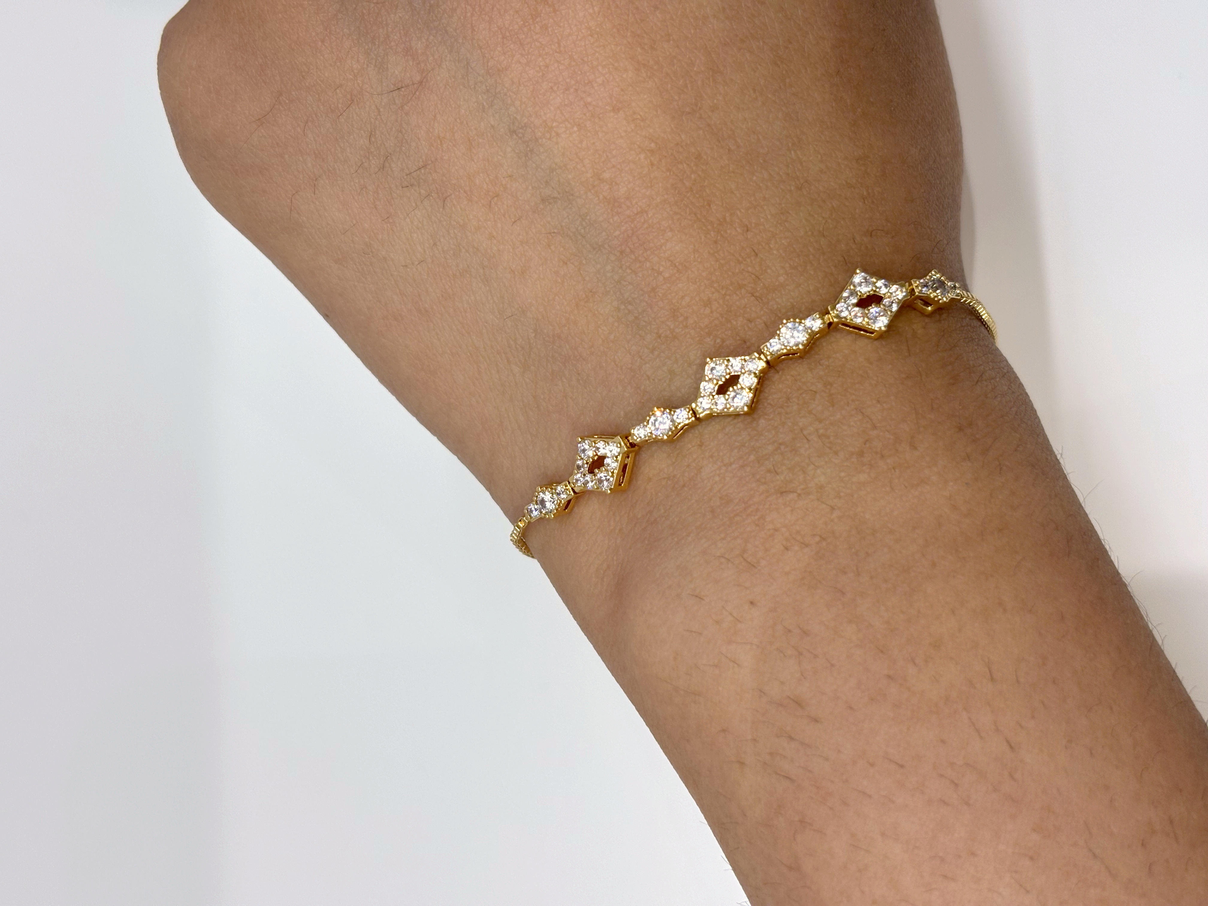 Marquise Crystal gold plated bracelet worn on wrist