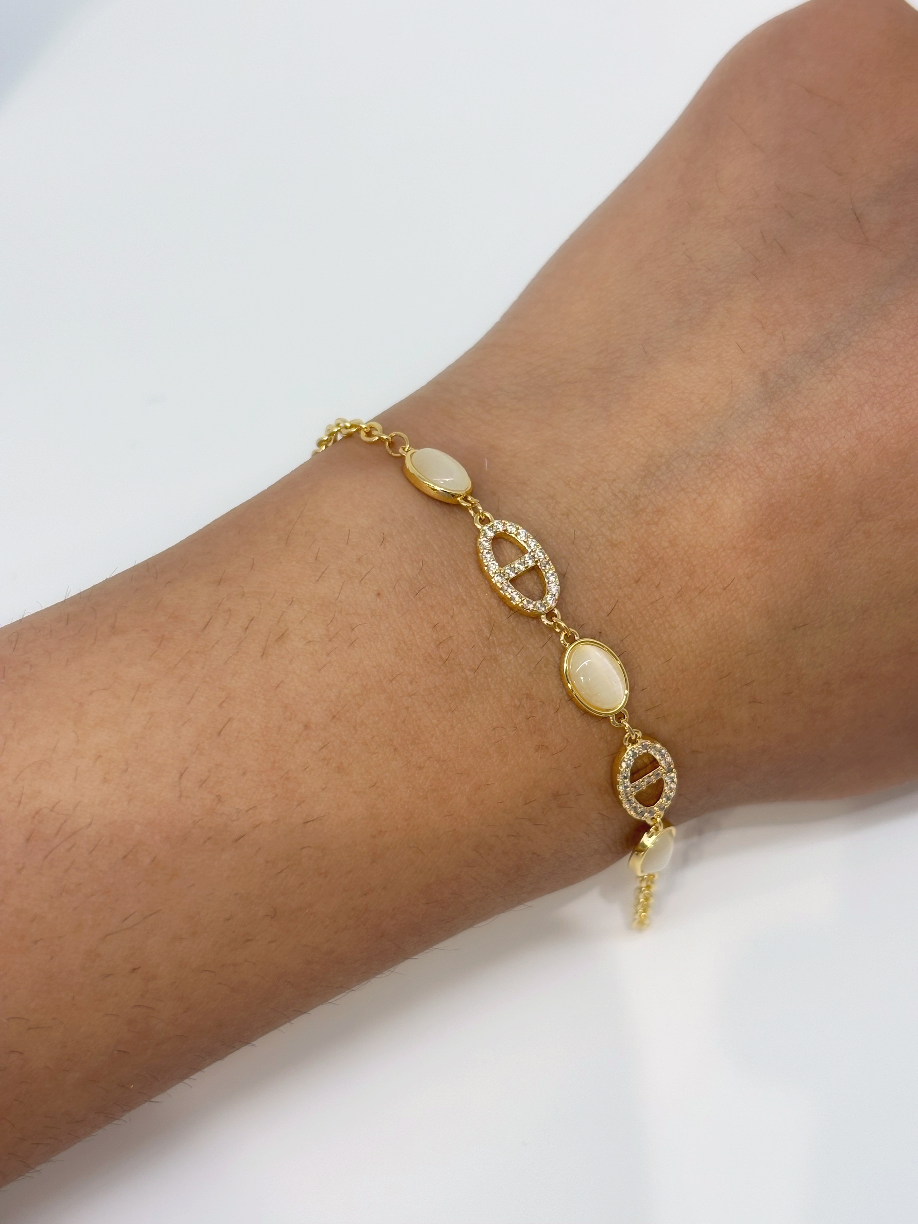Marquise Link gold plated bracelet worn on wrist