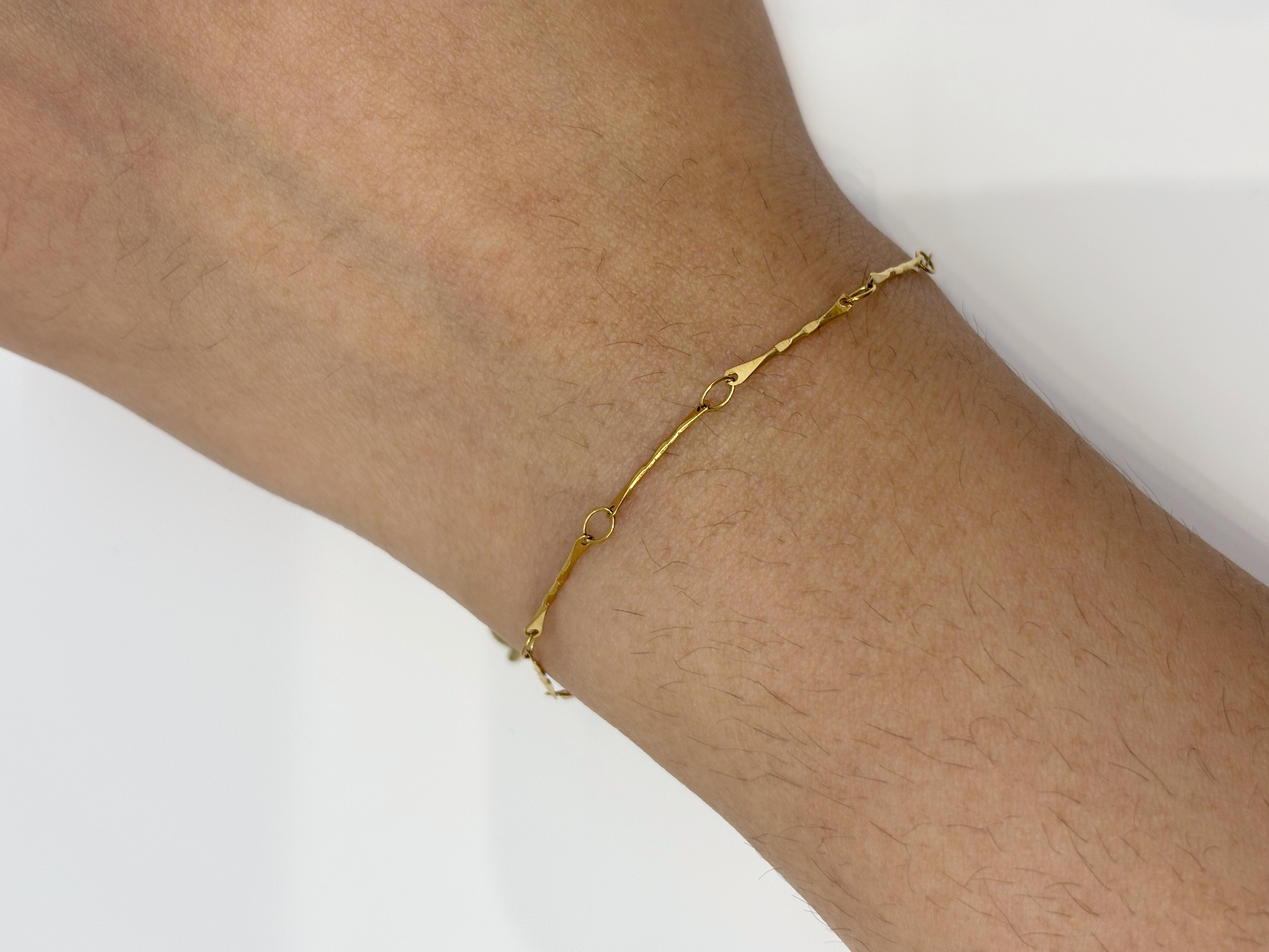 Minimal Bead Chain gold plated bracelet worn on wrist