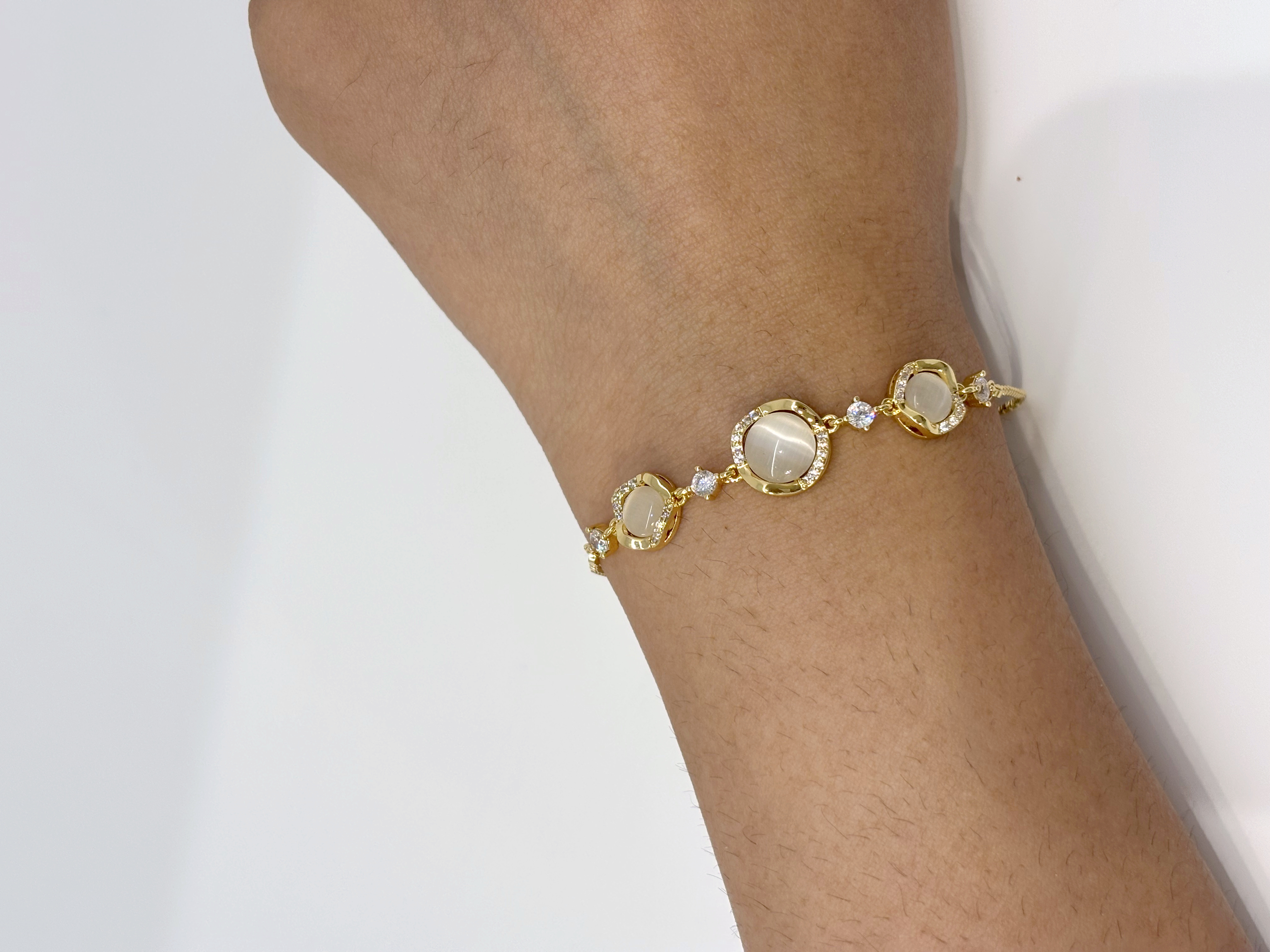 Mother of Pearl Circle gold plated bracelet worn on wrist