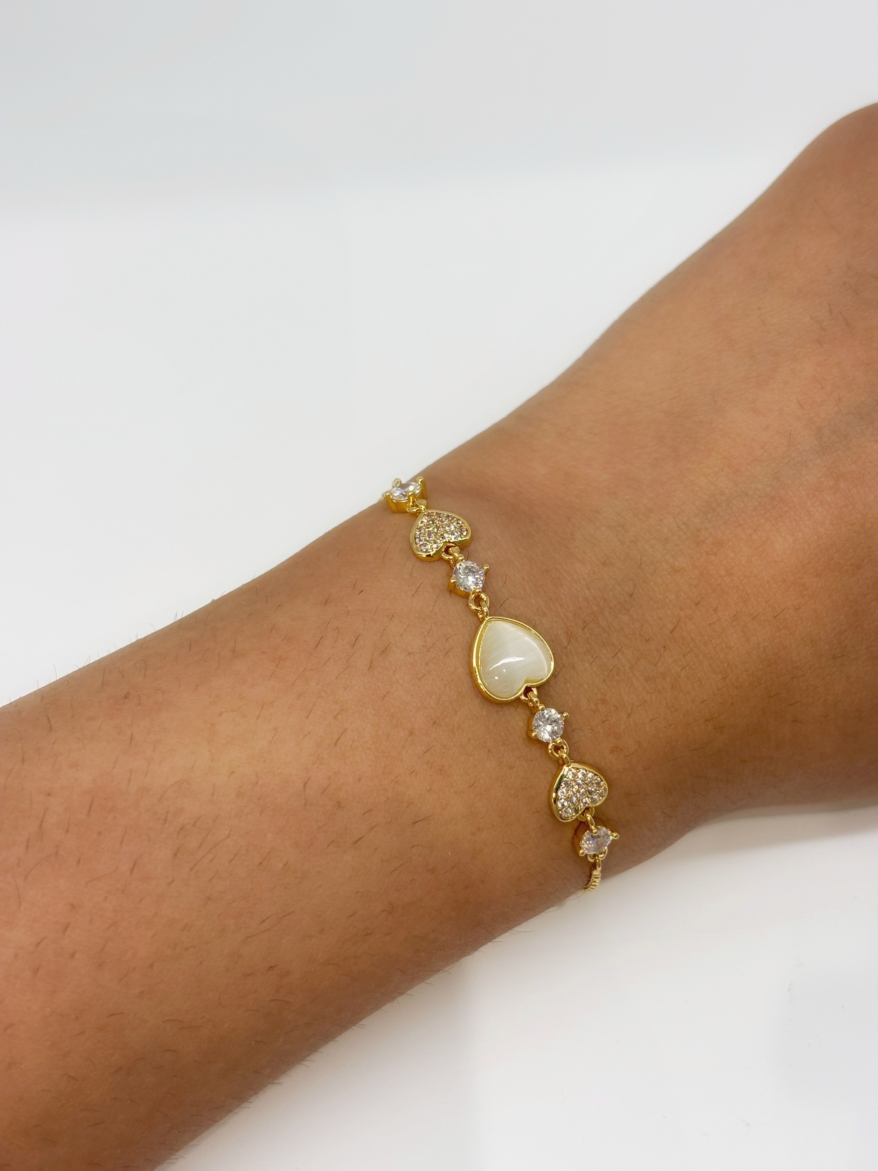 Mother of Pearl Oval gold plated bracelet worn on wrist
