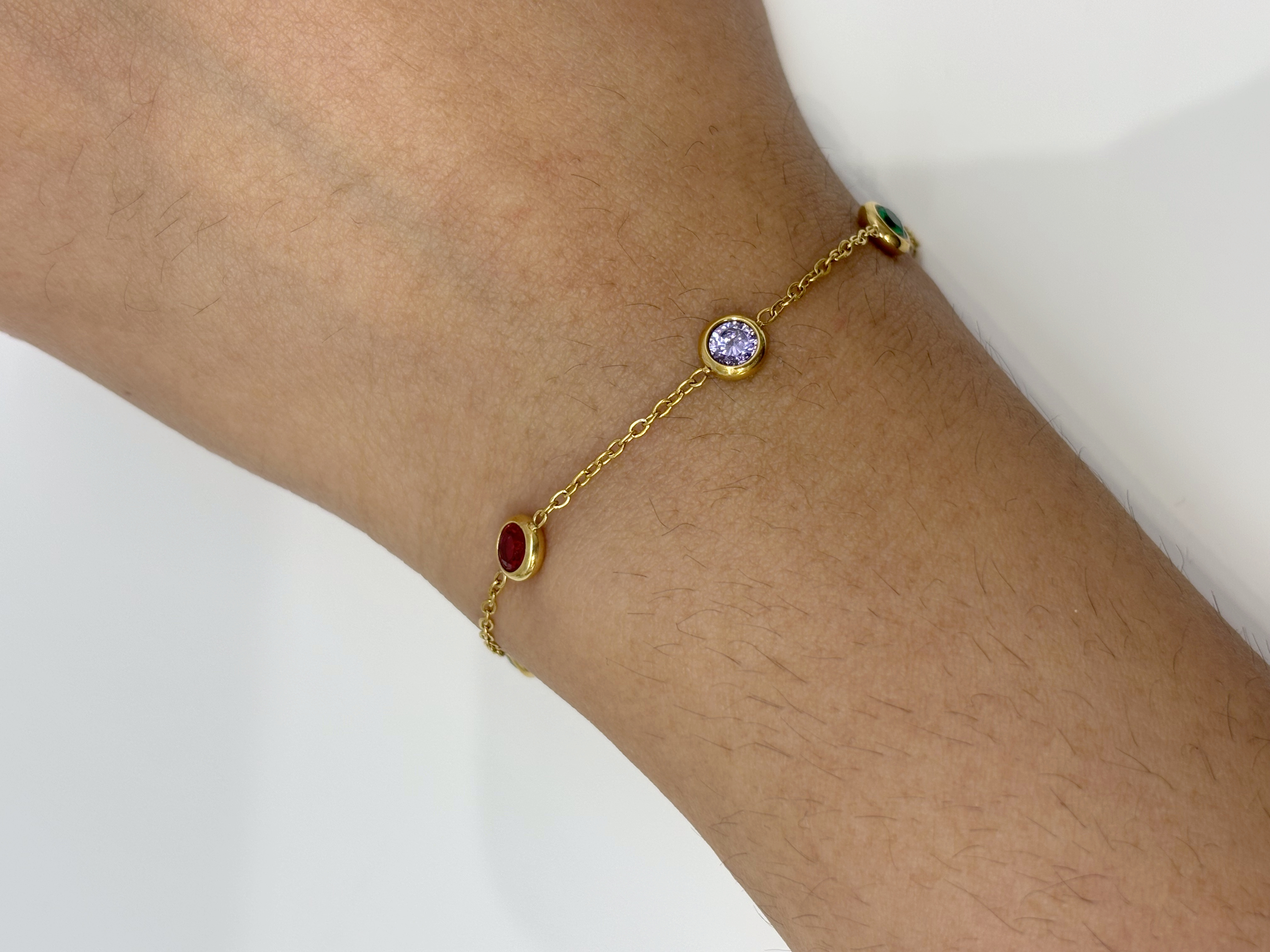 Multicolor Crystal Station gold plated bracelet worn on wrist