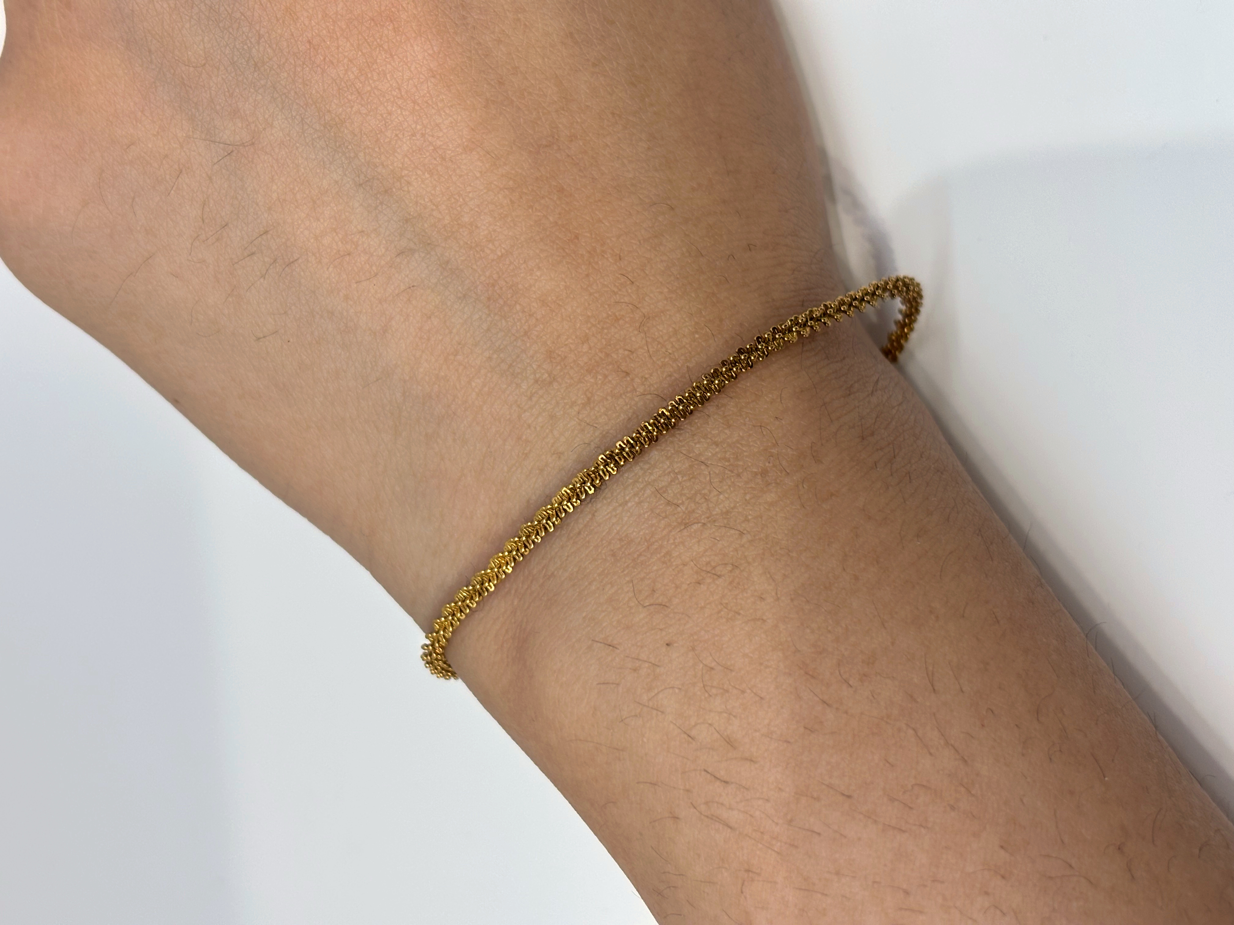 Snake Chain gold plated bracelet worn on wrist