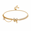 Star and Chain gold plated bracelet on white background