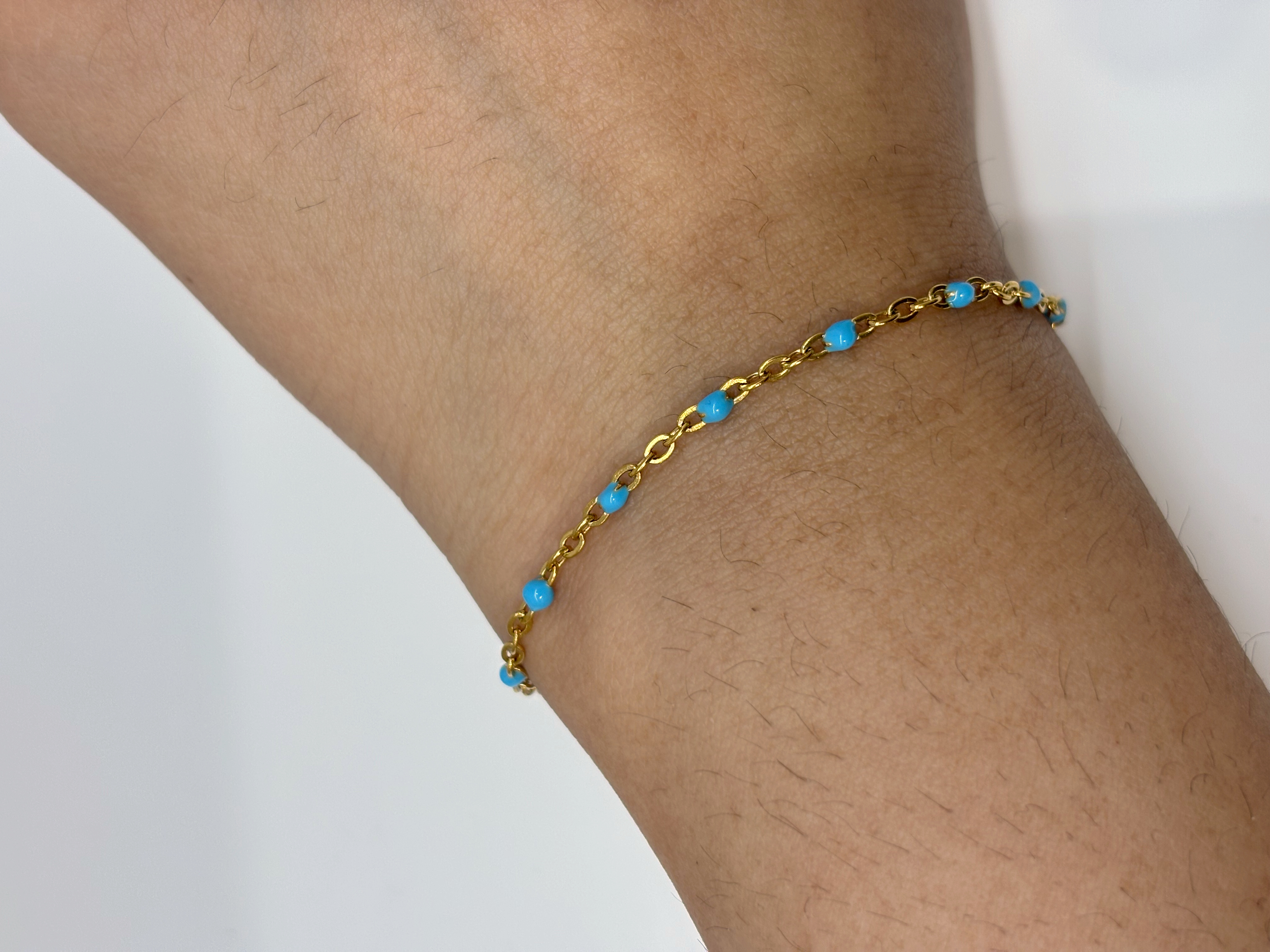 Turquoise Bead gold plated bracelet worn on wrist