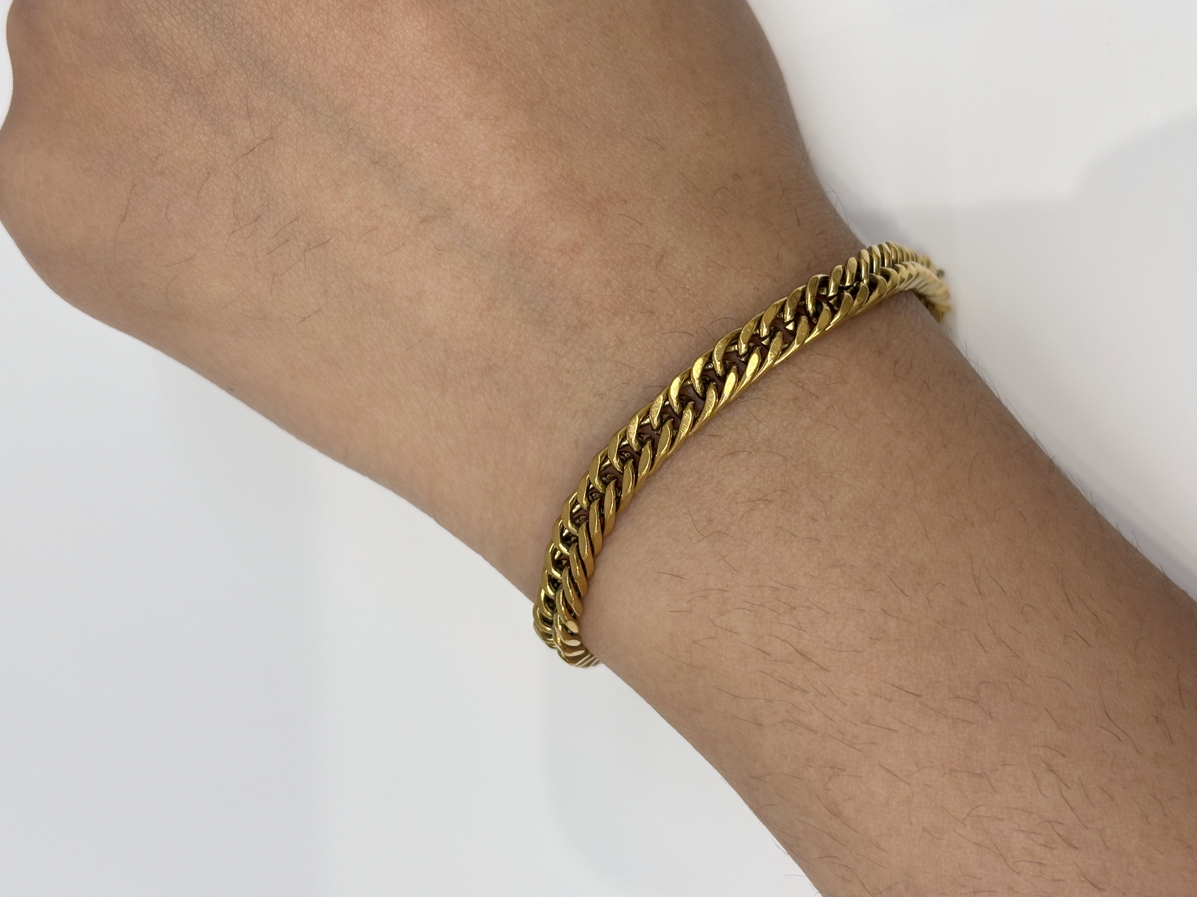 Twisted Rope Chain gold plated bracelet worn on wrist